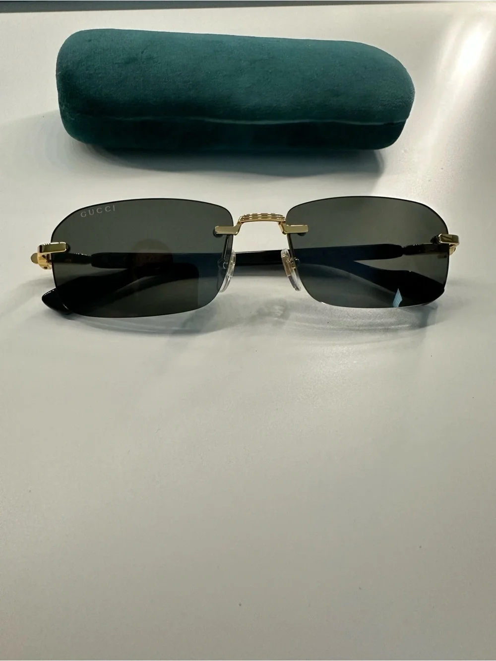 Gucci Men’s Rimless Sunglasses - Black and Gold